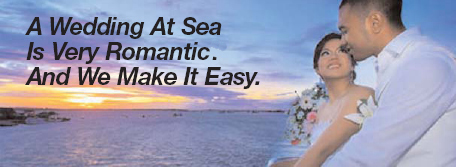 Young couple on the deck of a cruiseship at sunset. A wedding at sea is vry romantic. And we make it Easy.